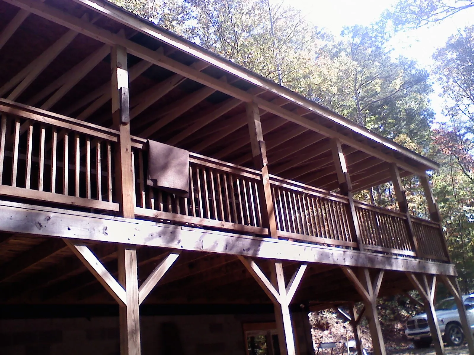 Timber framing under a new elevated porch and deck — Roof Leak Repair in Rexford by Roofing Brothers